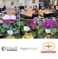 a group of people are at a meeting with orchids