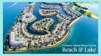 an aerial view of a beach and lake